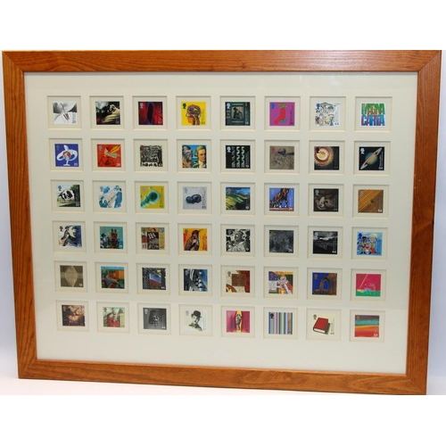 15 - Officially mounted and framed Royal Mail Millennium stamps collection. a total of 96 GB mounted post... 