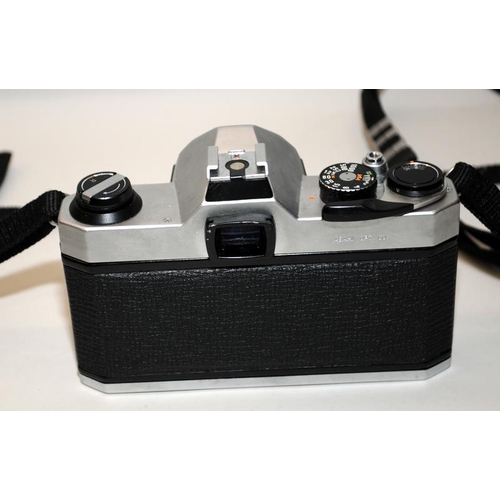 140 - Vintage Pentax K1000 35mm film SLR camera c/w Pentax-M 1:2 50mm prime lens. Film advance smooth, shu... 