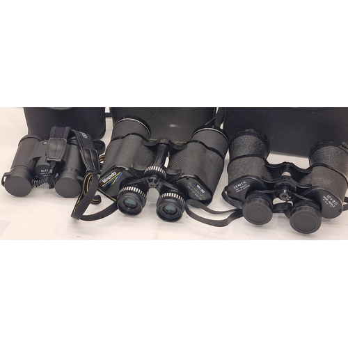 141 - Three cased pairs of binoculars to include Zenith, Miranda and Opticron.