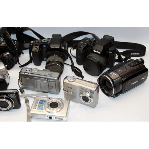 145 - A collection of digital cameras including Pentax, Olympus, Canon etc. All offered untested