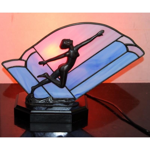 30 - Contemporary Art Deco style table lamp of a leaping lady against a painted glass backdrop, 24cms tal... 