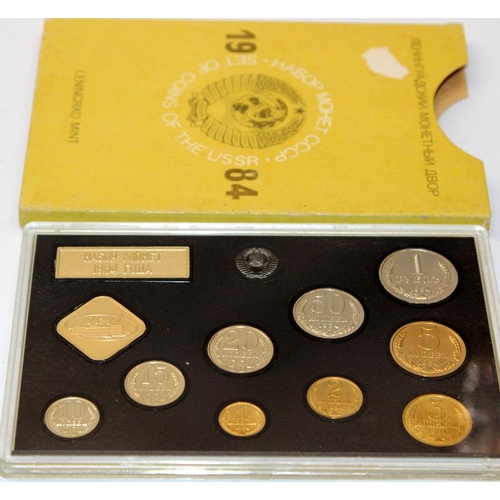 152 - Leningrad Mint Russian coin sets: 1980. 1981 and 1984, all encapsulated with slip cases