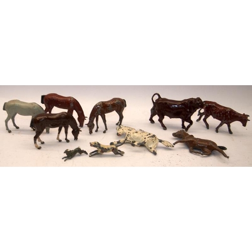 96 - A collection of early cast metal animals and figures including Britain's and Timpo