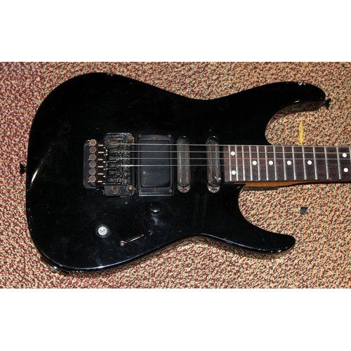 193 - Black body Charvel electric guitar with Japanese toothpaste headstock logo. Requires refurbishment.