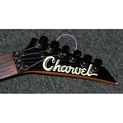 193 - Black body Charvel electric guitar with Japanese toothpaste headstock logo. Requires refurbishment.