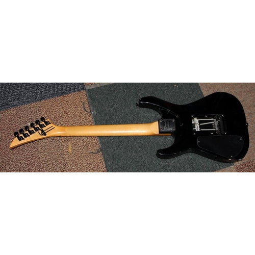 193 - Black body Charvel electric guitar with Japanese toothpaste headstock logo. Requires refurbishment.