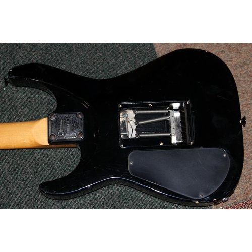 193 - Black body Charvel electric guitar with Japanese toothpaste headstock logo. Requires refurbishment.