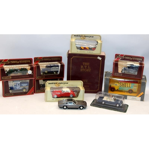 71 - A collection of boxed die-cast model vehicles including a Lledo Brooklands world speed records diara... 