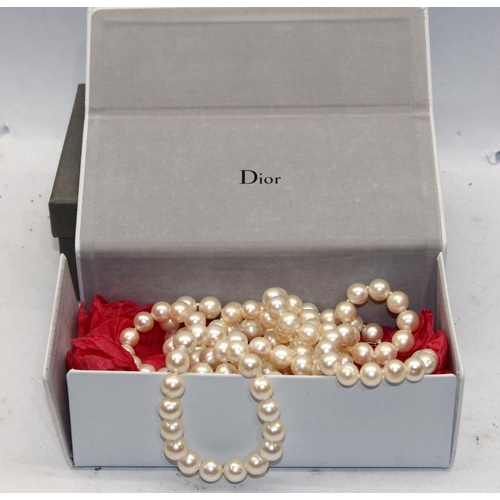 364 - 2 natural pearl necklaces presented in a Dior box