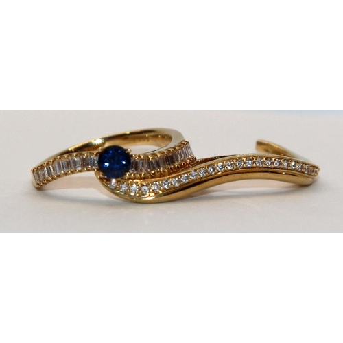 369 - Very unusual and striking 18ct gold double shank sapphire and diamond ring designed to be worn over ... 