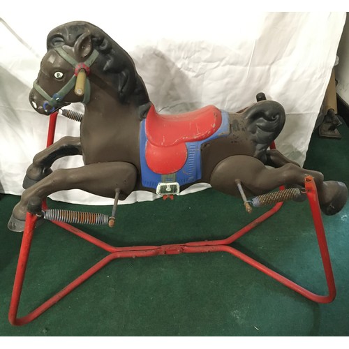 224 - A vintage Mobo rocking horse on metal frame base.