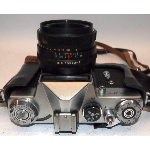 22 - Vintage Zenit EM 35mm SLR camera with 56mm prime lens. Lot also includes two further lenses with m48... 