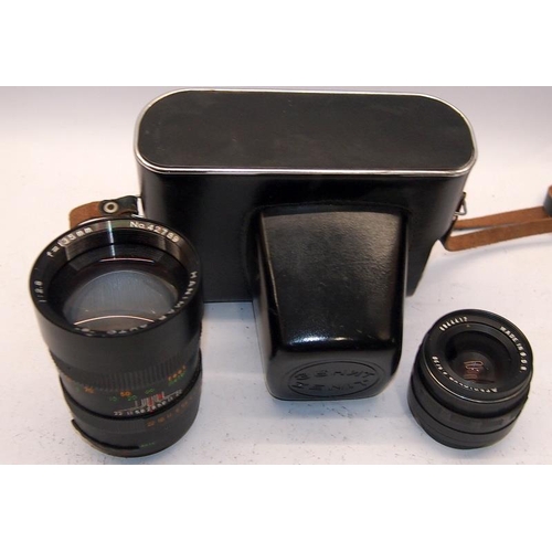 22 - Vintage Zenit EM 35mm SLR camera with 56mm prime lens. Lot also includes two further lenses with m48... 