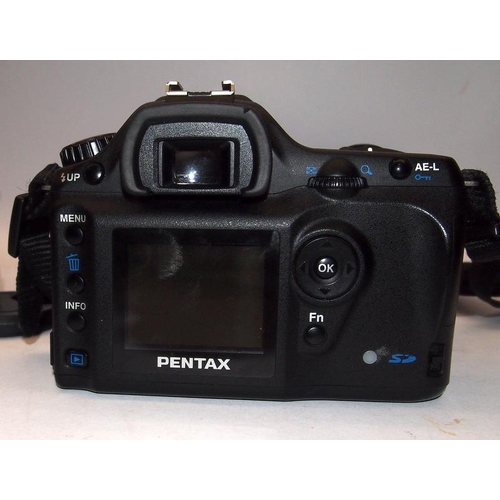 24 - Pentax ist Ds digital SLR camera with 18-55 zoom lens c/w batteries, charger and gadget bag