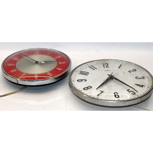 229 - Two vintage Metamec electric wall clocks, the largest is 21cms across