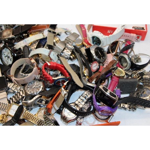 328 - Large collection of ladies and gents fashion watches