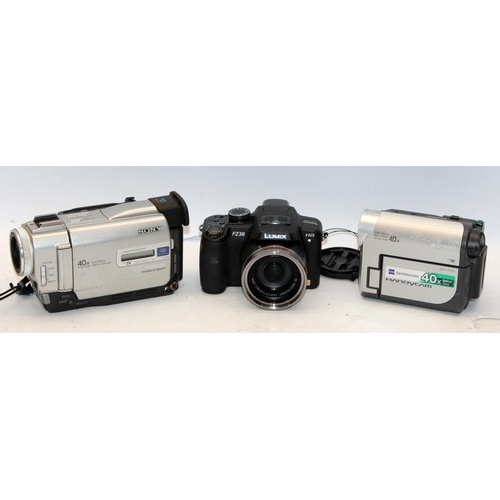 294 - A collection of cameras and lenses to include 35mm SLR and digital examples. Nikon Pentax, Canon, Lu... 