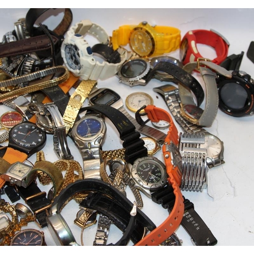 382 - A large collection of ladies and gents fashion watches