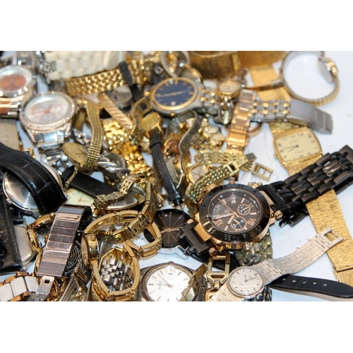 384 - A large collection of ladies and gents fashion watches