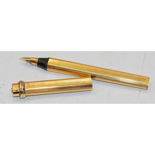 83 - Genuine vintage Les Must de Cartier gold plated fountain pen with 18ct gold nib. Comes with complete... 