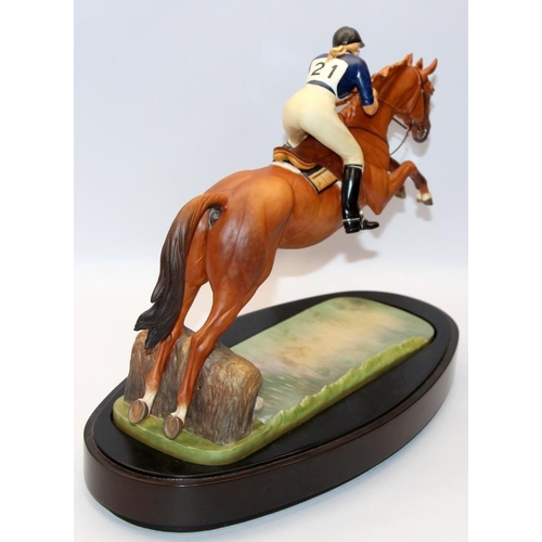 322 - Royal Worcester equestrian statuette of HRH The Princess Anne riding Doublet, taking a water jump. D... 