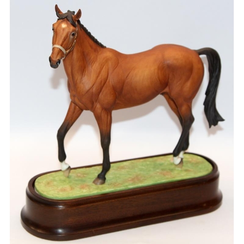 325 - Royal Worcester equestrian statuette of the famous racehorse Nijinsky. Designed by Doris Lindner wit... 