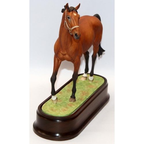 325 - Royal Worcester equestrian statuette of the famous racehorse Nijinsky. Designed by Doris Lindner wit... 