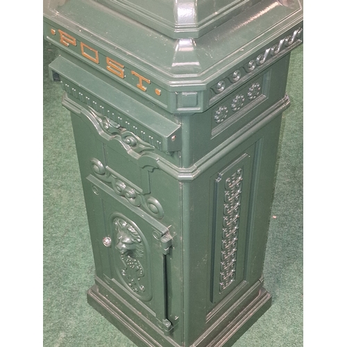 380 - Contemporary Khaki green coloured metal post box. Includes two keys for back door only. 105cm tall.