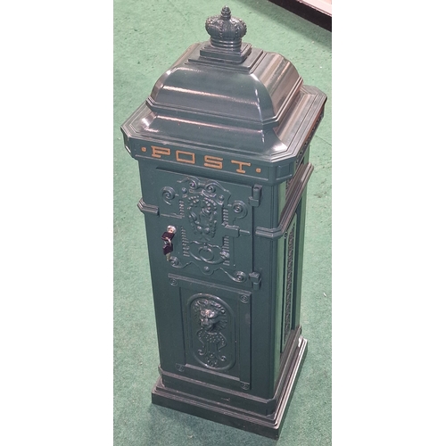 380 - Contemporary Khaki green coloured metal post box. Includes two keys for back door only. 105cm tall.