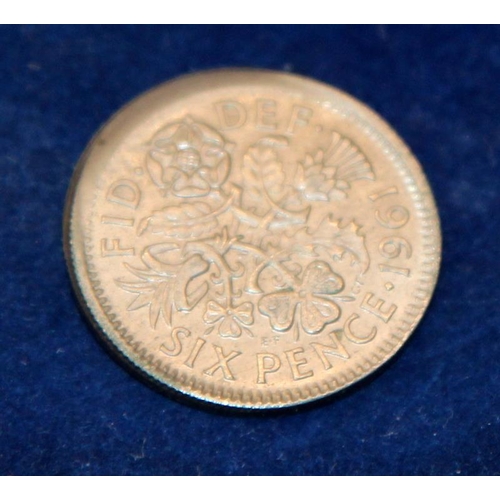 379 - Rare 1961 off centre mis-strike Sixpence piece with high lip rim to obverse