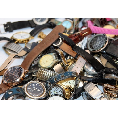 346 - A large collection of ladies and gents fashion watches, all offered untested