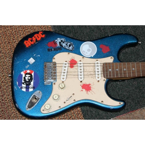 293 - Johnson electric strat guitar, metallic blue body with white scratchplate.