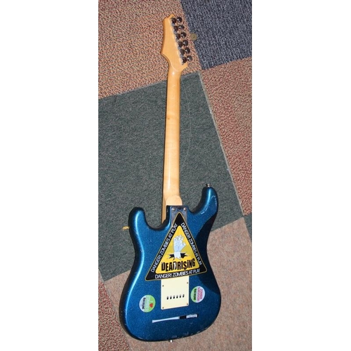 293 - Johnson electric strat guitar, metallic blue body with white scratchplate.