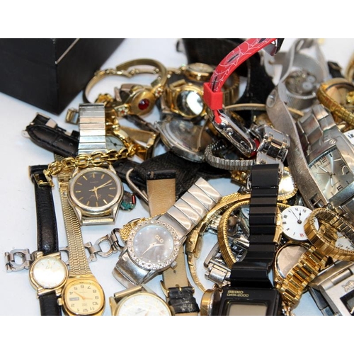 326 - A large collection of fashion watches, pocket watches and watch movements