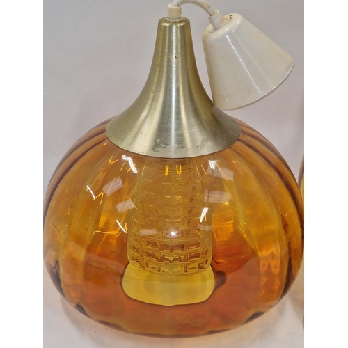 170 - Pair of mid 20th century amber glass Swedish onion shape pendant hanging light fittings.