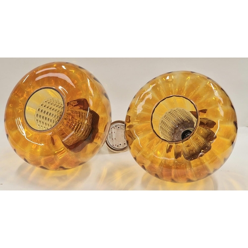 170 - Pair of mid 20th century amber glass Swedish onion shape pendant hanging light fittings.