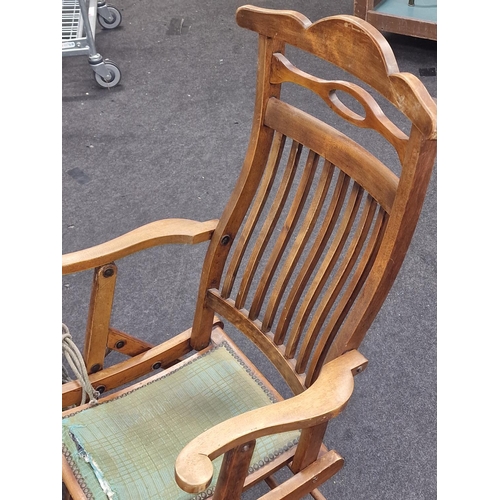 173 - Antique folding wooden campaign chair together with a vintage glass fishing float.