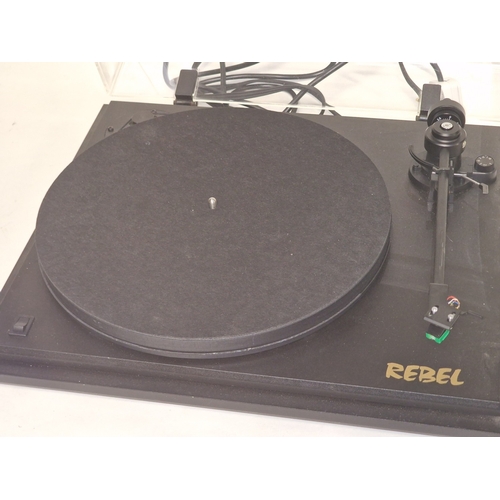 173 - Revolver Rebel turntable fitted with Audio Technica cartridge. Turntable powers up and spins when co... 