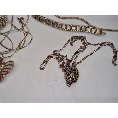 308 - Collection of silver necklaces and pendants total 210grms