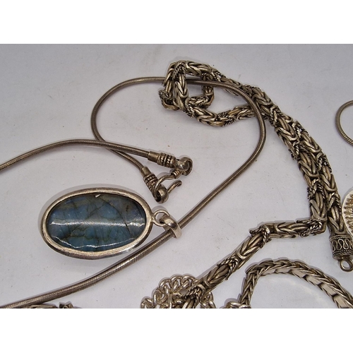 308 - Collection of silver necklaces and pendants total 210grms