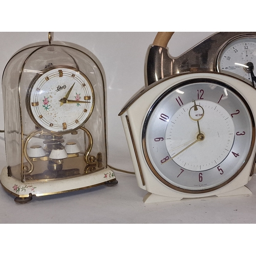 4 - Collection of clocks to include vintage electric Metamec and Schatz anniversary clock.