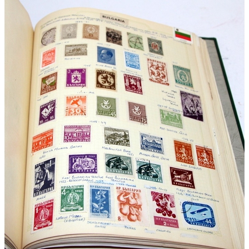 202 - Stamps: Three very good albums of mounted world stamps sorted alphabetically from Abu Dhabi through ... 