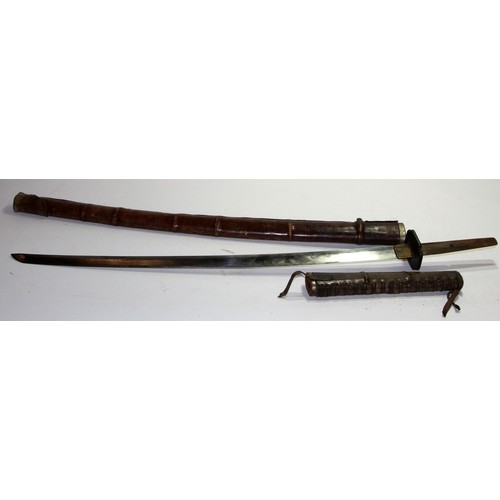 155 - Vintage Japanese Katana sword with a blade length of 65cms. No signature to tang. Housed in a tan le... 