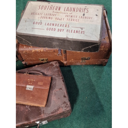 196 - A collection of vintage suitcases of varying size together with a Southern Laundry box.