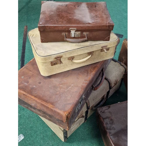 196 - A collection of vintage suitcases of varying size together with a Southern Laundry box.