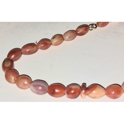 304 - Scottish carnelian agate necklace with 9ct gold clasp. 56cm total length.