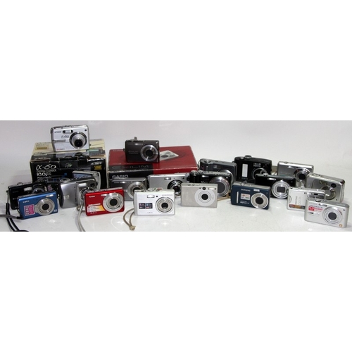 221 - A large collection of digital compact cameras, all offered untested