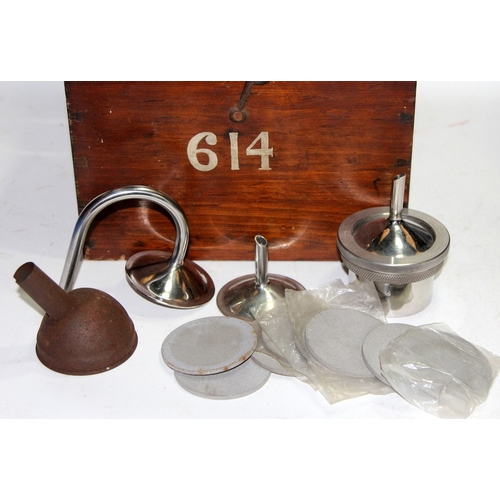 223 - Vintage medical equipment: Cased MPC straining nozzles, a stack of Griffin & Tatlock test sieves, a ... 