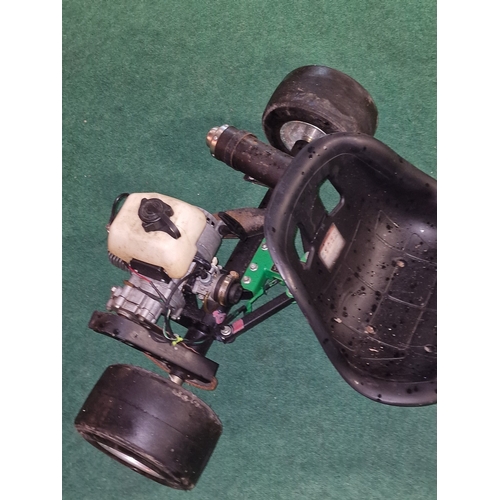 233 - A petrol powered tricycle go kart with engine fitted to rear.