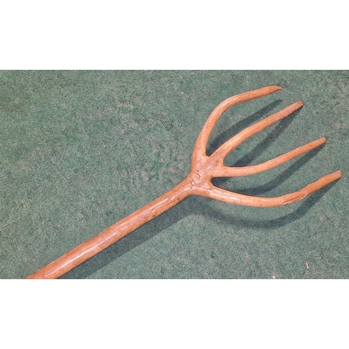 236 - A vintage European wooden agricultural hay fork 143cm long.